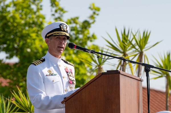 Naval Station Rota leadership salutes and conducts honors for Change of Command.