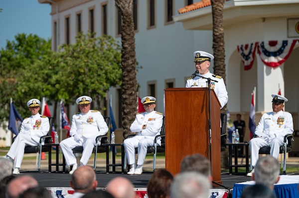 Naval Station Rota leadership salutes and conducts honors for Change of Command.