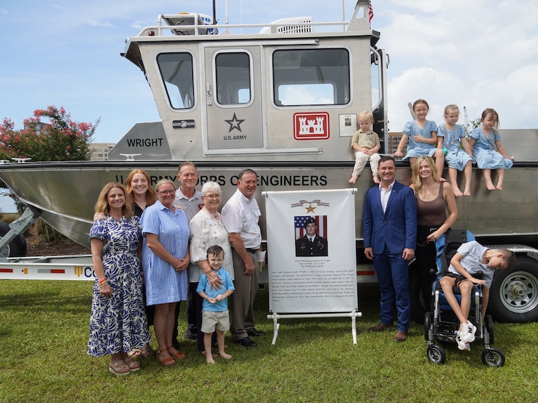 The family of Staff Sgt. Dustin Wright shown in front of the newly dedicated S/V Wright. Wright was one of three U.S. Army Soldiers from Georgia who was honored by the U.S. Army Corps of Engineers, Savannah District with a survey vessel dedicated in his name June 12, 2025, at the Savannah District’s Engineers Depot in Savannah, Georgia.