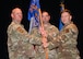 Group commander hands guideon to new squadron commander