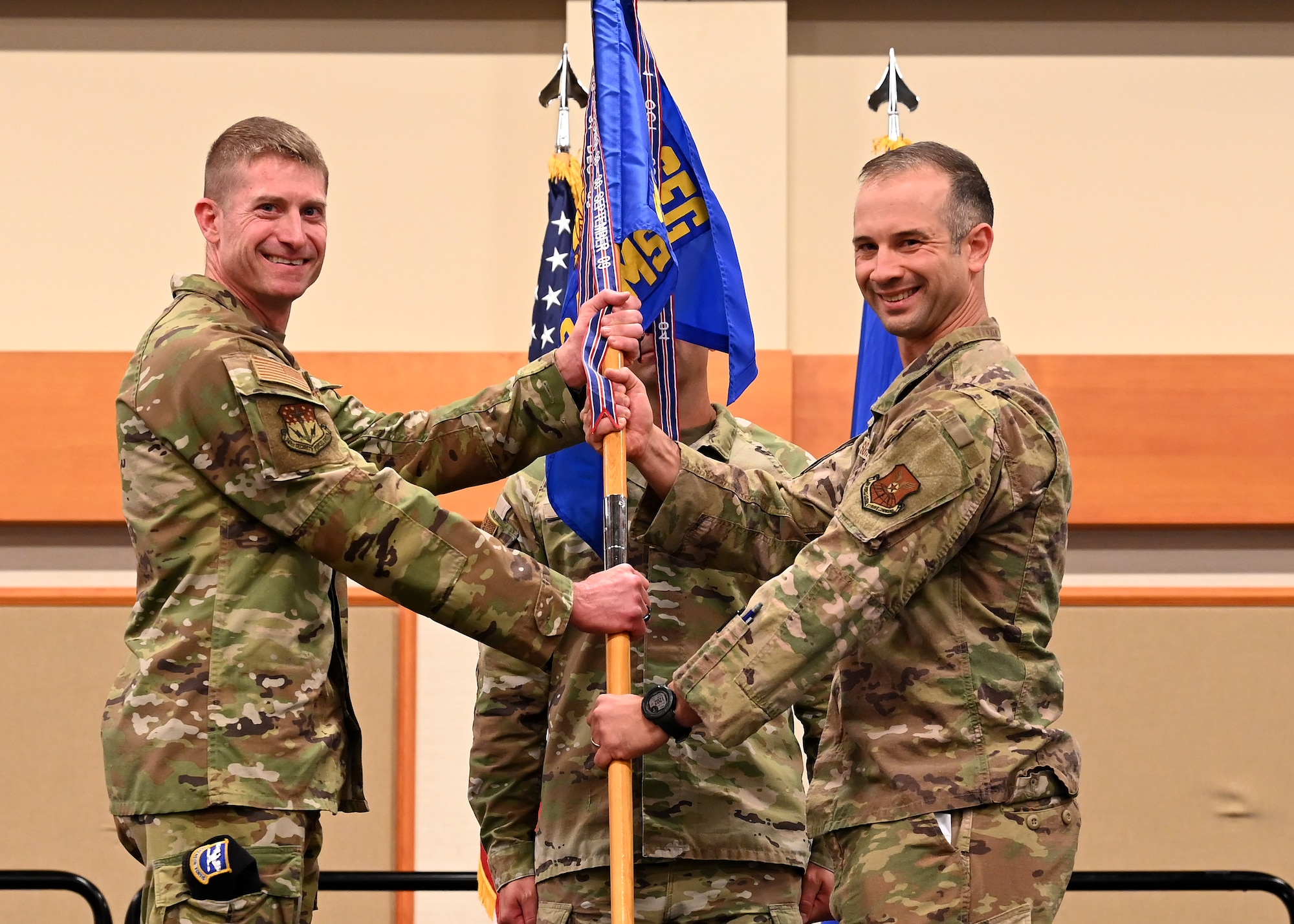 Group commander handing the guideon to a new squadron commander
