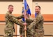 Group commander handing the guideon to a new squadron commander