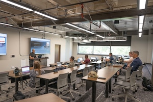 U.S. Air Force senior non-commissioned officers from Dyess Air Force Base attend a project management course at Hardin-Simmons University, Abilene, Texas, June 2, 2025. Thanks to the partnership between the 7th Healthcare Operations Squadron and Dr. Janelle O’Connell, 7th HCOS honorary commander and former Dean of the College of Health Professions at HSU, senior enlisted leaders from Dyess were able to attend the course on the HSU campus. (U.S. Air Force photo by Airman Caleb Schellenberg)