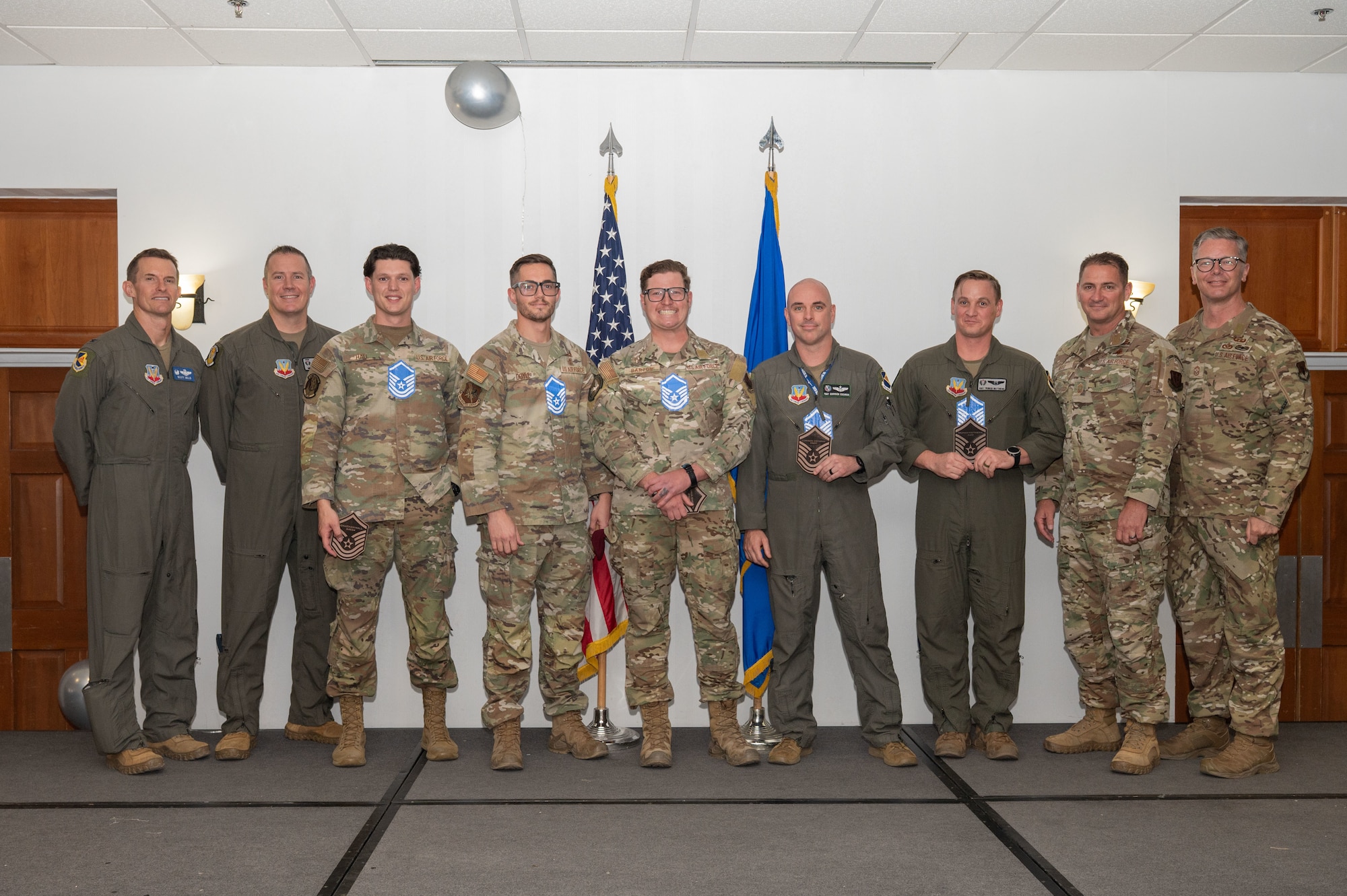 U.S. Air Force technical sergeants from the 563rd Rescue Group pose for a group photo during the Master Sergeant Release Party at Davis-Monthan Air Force Base, Arizona, June 11, 2025. Of the 25,805 technical sergeants eligible for promotion to master sergeant, 6,043 were selected. (U.S. Air Force photo by Airman Jaden Kidd)