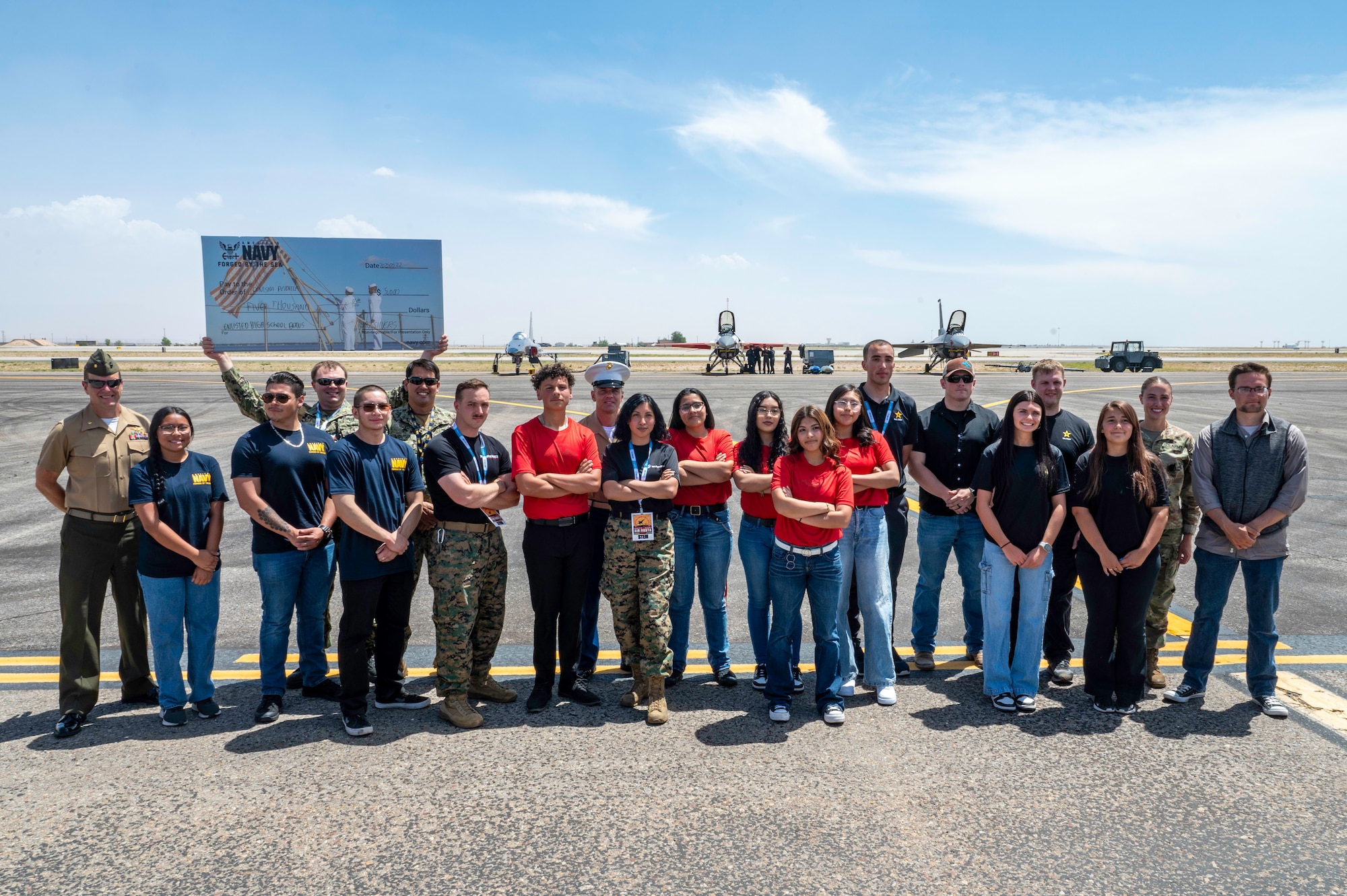 Twelve members perform swear in ceremony in front of two F16's
