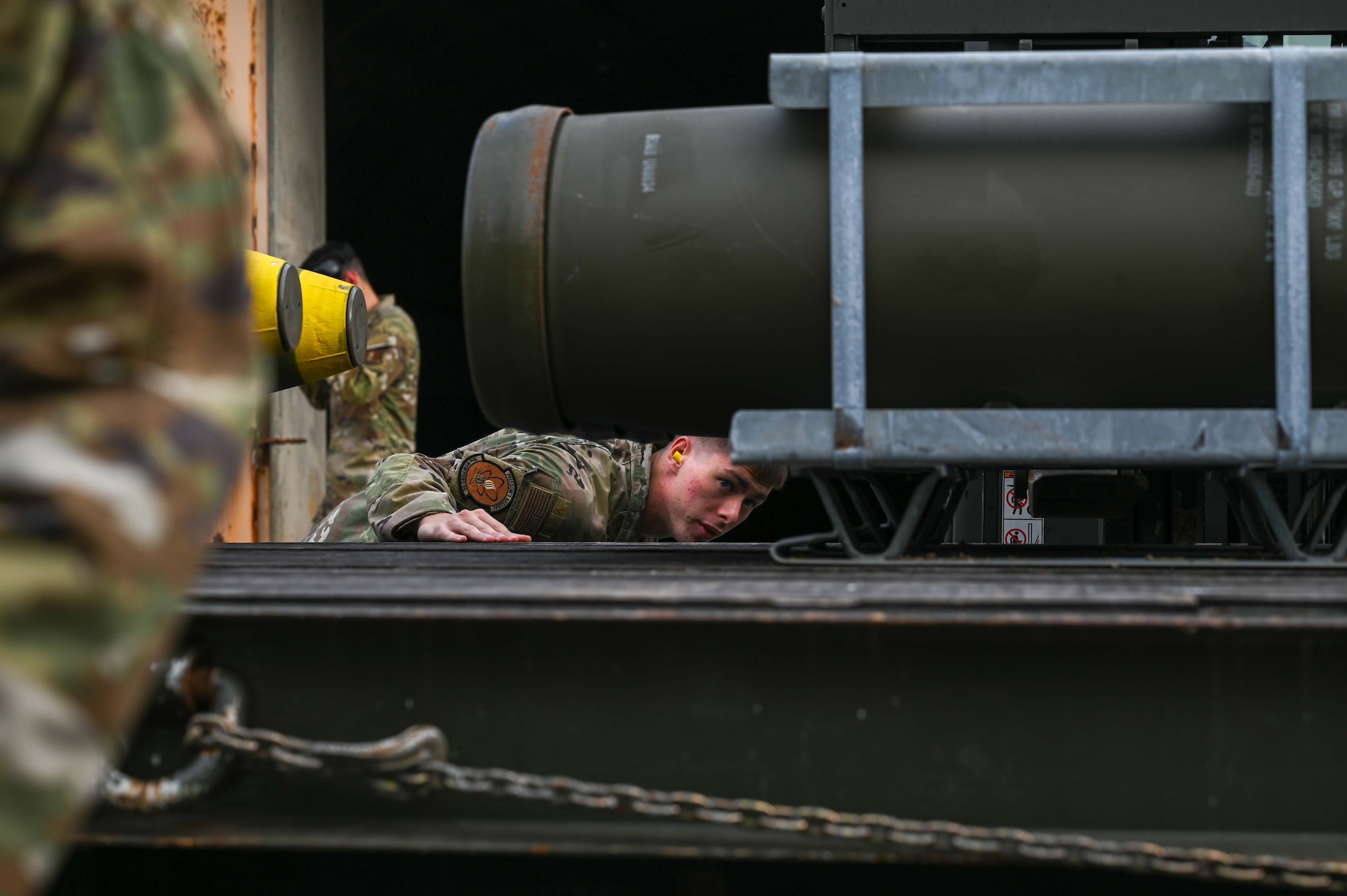 A U.S. Air Force Airman inspects munitions.