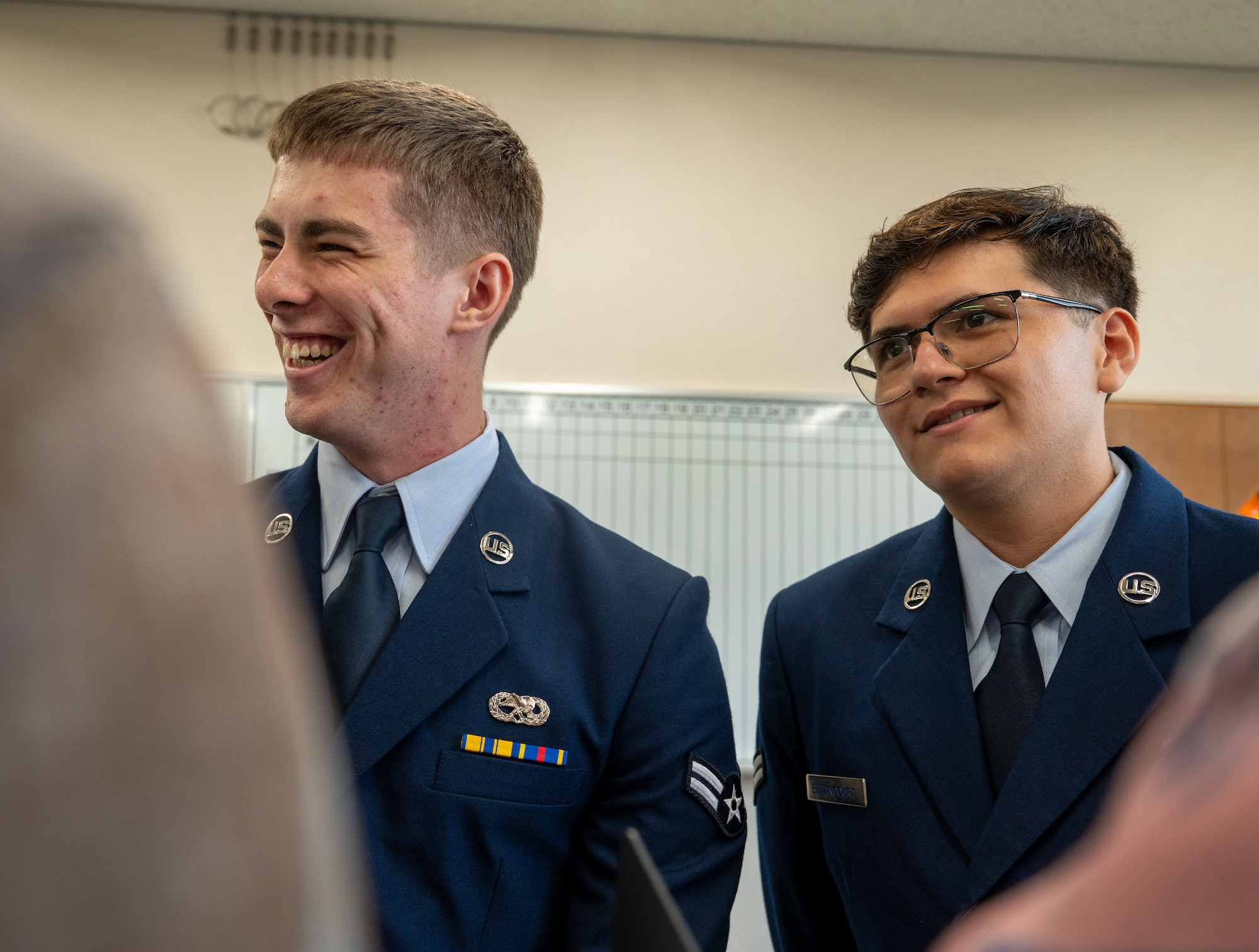 U.S. Air Force Airmen answer questions during an interview.