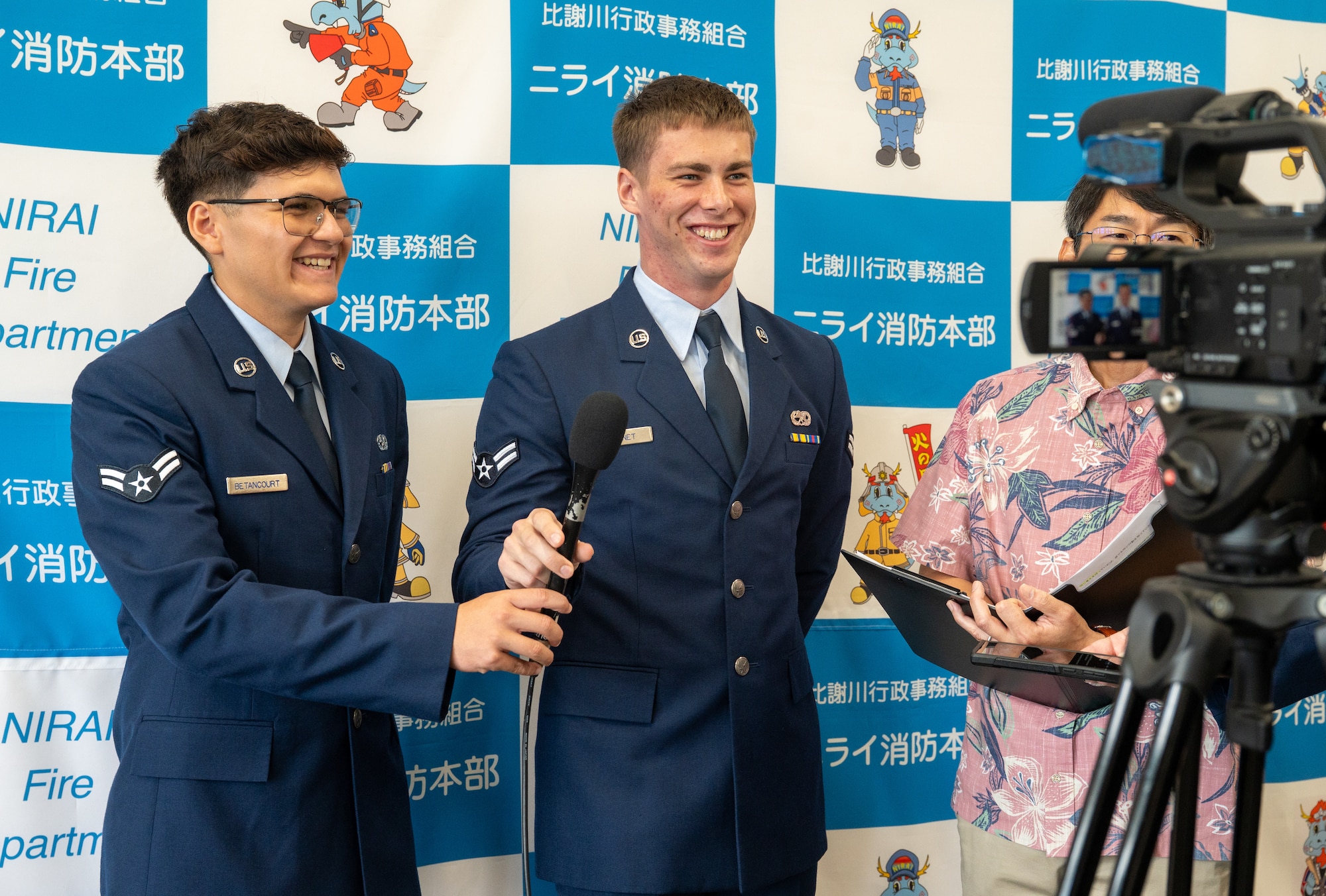 U.S. Air Force Airmen answer questions during an interview.