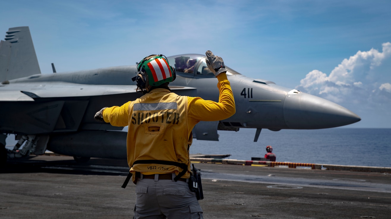 An F/A-18E Super Hornet from the “Blue Diamonds” of Strike Fighter Squadron (VFA) 146 prepares to launch from the flight deck of the aircraft carrier USS Nimitz (CVN 68) in the South China Sea, June 6, 2025.