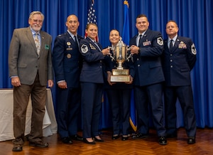The Thomas N. Barnes Center for Enlisted Education’s Foundations Force Development Section receives the 2024 General Muir S. Fairchild Educational Achievement Award during a ceremony on Maxwell Air Force Base, Alabama, June 11, 2024. (U.S. Air Force photo by Brian Ferguson)