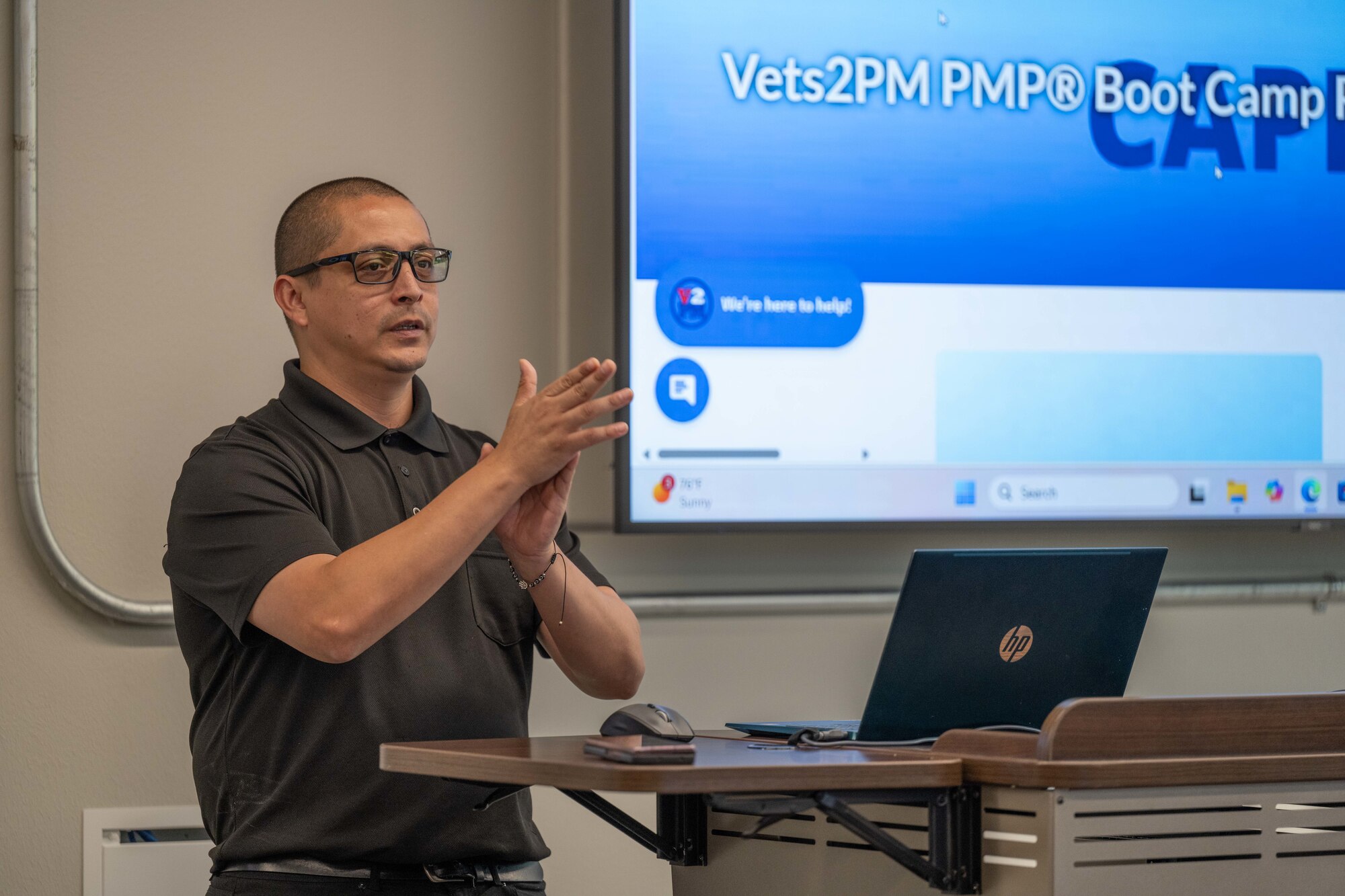 Jozue Chaires, the Vets2PM portfolio manager, teaches a project management course at Hardin-Simmons University, Abilene, Texas, June 2, 2025. The project management course provided Airmen with the knowledge and tools necessary to effectively manage projects of all sizes, from small-scale initiatives to large-scale operations. The skills learned in the course are directly applicable to their roles within the Air Force and may contribute to increased efficiency and effectiveness. (U.S. Air Force photo by Airman Caleb Schellenberg)