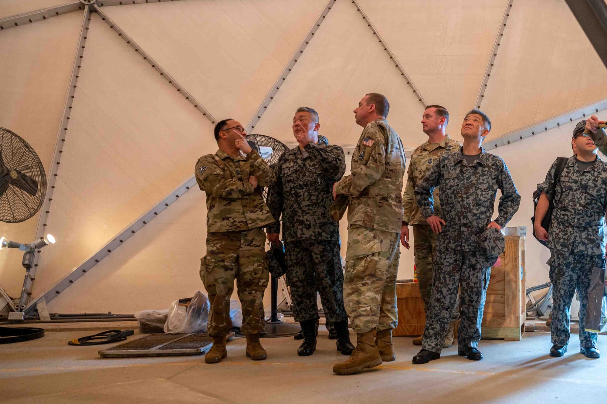 U.S. service members and Japanese service members tour U.S. facilities.