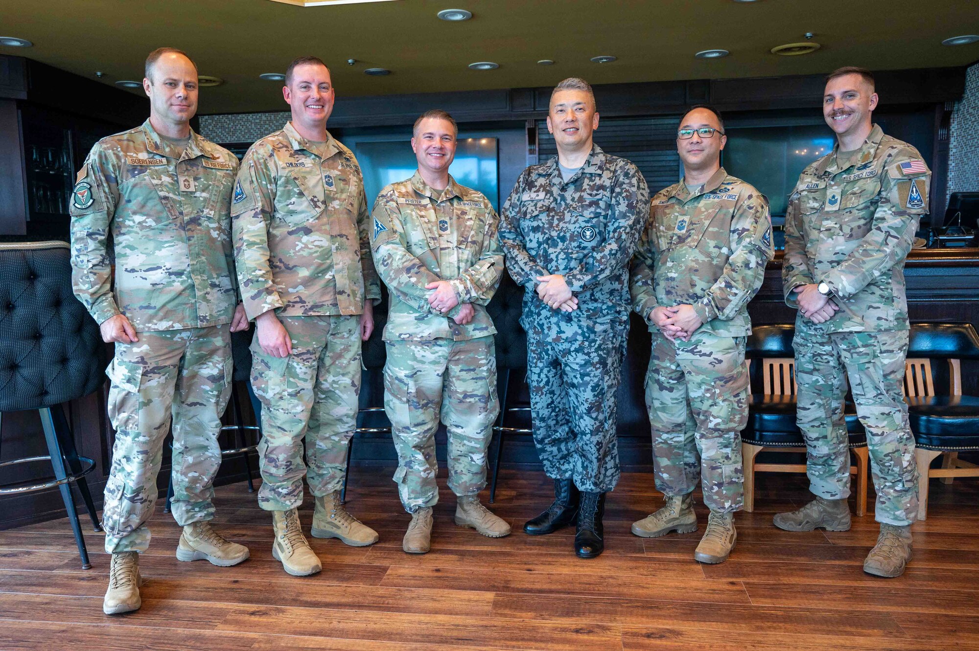 Japan and U.S. service members pose for a photo.