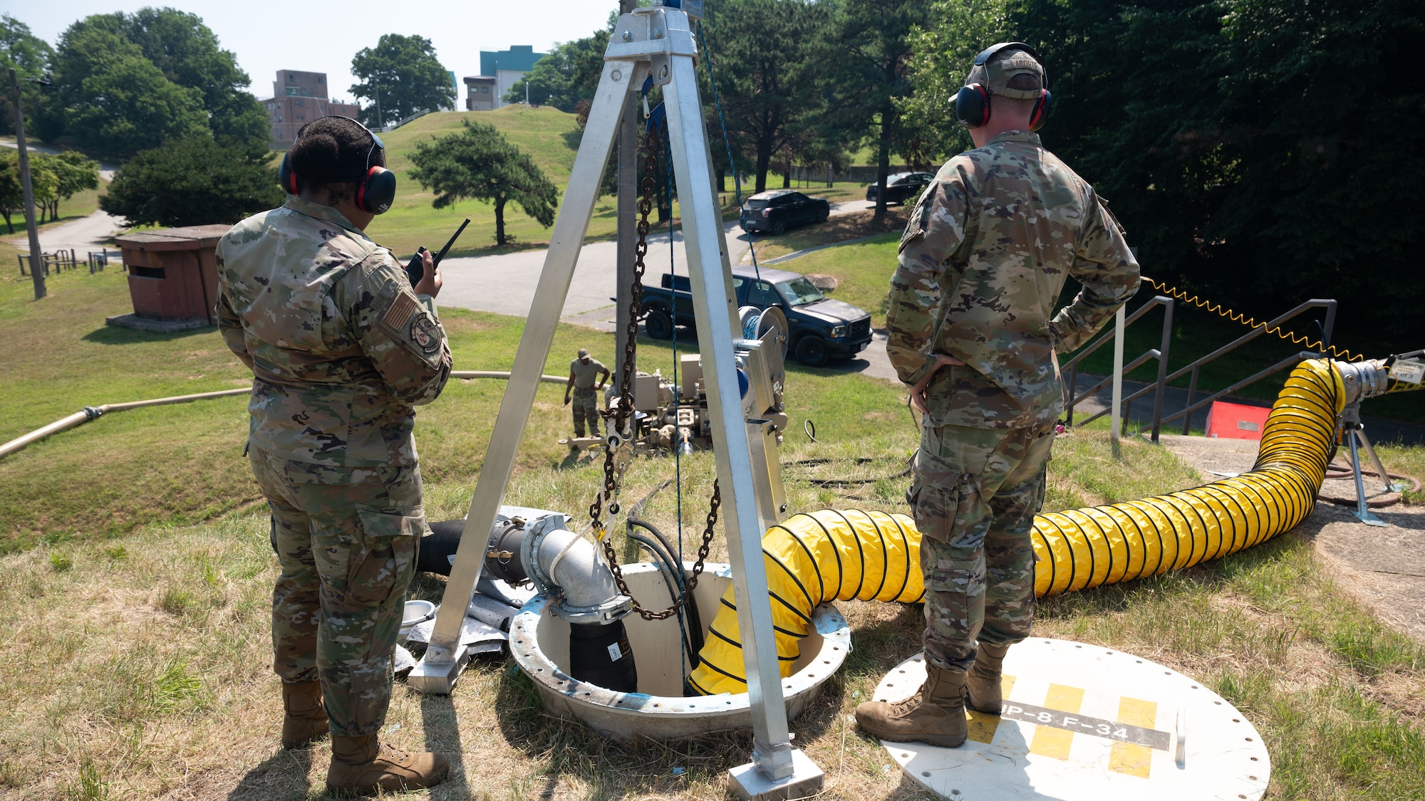 U.S. Air Force Staff Sgt. Briana Rogers, 51st Civil Engineer Squadron water and fuels systems maintenance technician, and Senior Airman Nicholas Lacoste, 51st CES water and fuels systems maintenance journeyman, oversees the hydraulic driven pump belonging to the Water and Fuel Expedient Repair System at Osan Air Base, Republic of Korea, June 11, 2025. The 51st CES and the 51st Logistics Readiness Squadron collaborated on a combined effort training Airmen on the new WaFERS system demonstration. This capability enables sustained air operations by ensuring aircraft can continue to receive fuel, even when main fuel lines or infrastructure are damaged. (U.S. Air Force photo by Senior Airman Rome Bowermaster)