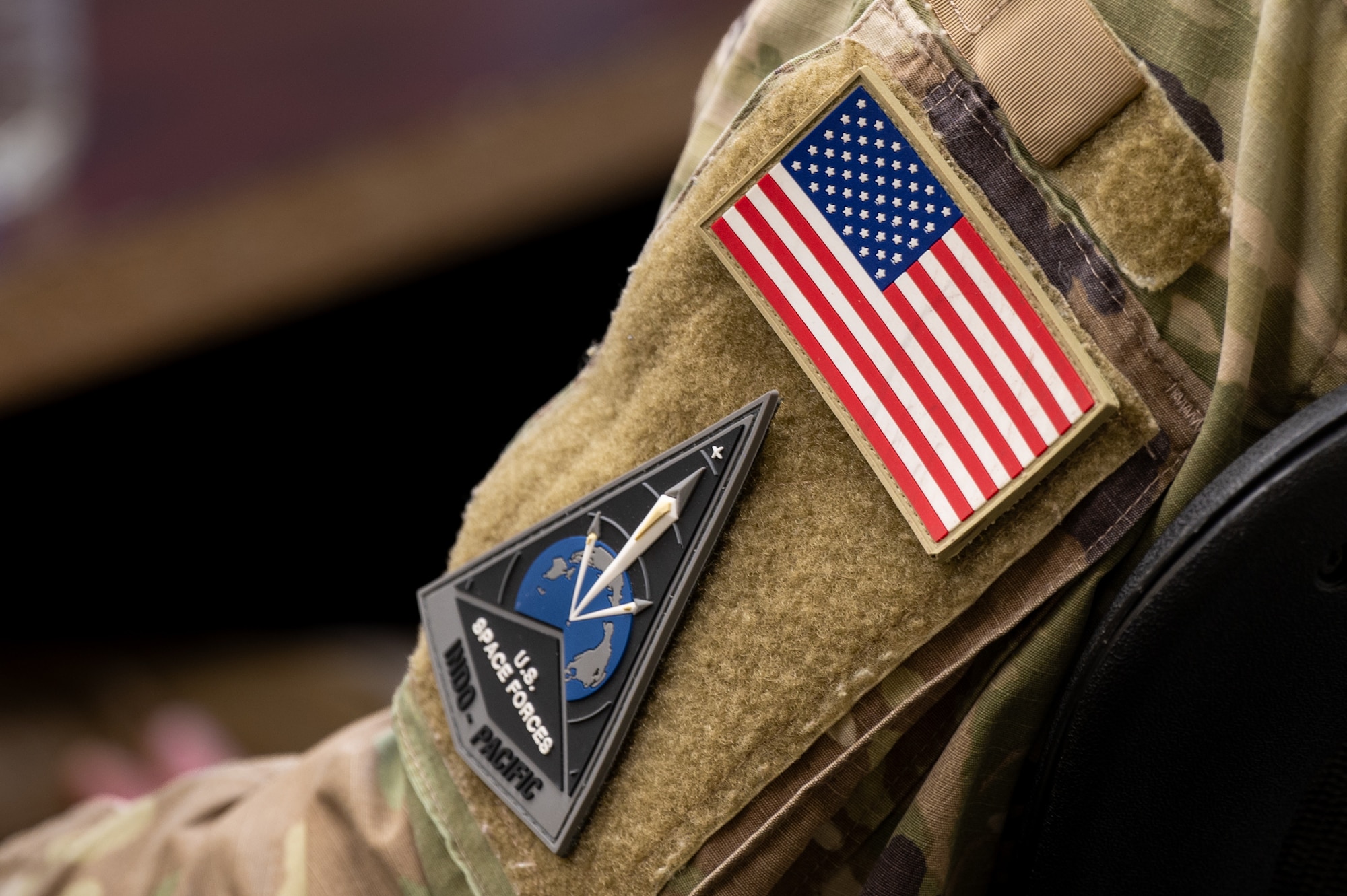 U.S. service member wears patches