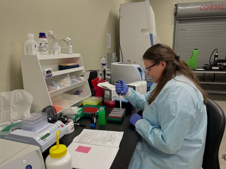 241205-N-N1574-1001 JACKSONVILLE, Fl. (Dec. 5, 2024) Danielle Gill, a biologist with Battelle Memorial Institute, extracts nucleic acid from houseflies on board Naval Air Station Jacksonville, Dec. 5, 2024. Under the leadership of Cmdr. Theron Hamilton, assistant officer in charge (AOIC) of Navy Entomology Center of Excellence (NECE), the team is driving a culture of continuous learning and innovation a groundbreaking three-year project is utilizing common houseflies as living sentinels to monitor existing and emerging microbial dangers to U.S. military personnel worldwide. (U.S. Navy photo courtesy of Dr. Jason Blanton)