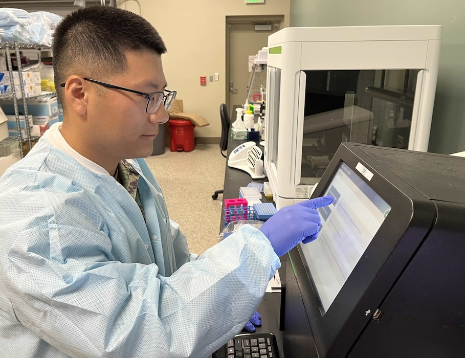 250513-N-N1574-1002 JACKSONVILLE, Fl. (May 13, 2025) Lt. John So, assigned to Navy Entomology Center of Excellence, programs a sequencing instrument on board Naval Air Station Jacksonville, May 13, 2025, as part of a groundbreaking three-year project is utilizing common houseflies as living sentinels to monitor existing and emerging microbial dangers to U.S. military personnel worldwide. By investing in cutting-edge science and empowering experts to solve real-world challenges, NECE embodies the Navy’s “Get Real, Get Better” mindset—improving warfighter health through innovation. (U.S. Navy photo courtesy of Dr. Jason Blanton)