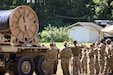 U.S. Army Reserve Soldiers from the 141st Quartermaster Company teamed up with soldiers from the United Kingdom’s 152nd North Irish Regiment, Royal Logistic Corps, to set up an assault hose system at Fort Barfoot, Virginia, on June 9, 2025. Mojave Falcon is a multi-faceted, first-of-its-kind Army Reserve training exercise that integrates the Combat Support Training Exercise (CSTX), National Training Center (NTC), Global Medic, Quartermaster Liquid Logistics Exercise (QLLEX), Port Operations, and Nationwide Move (U.S. Army Reserve photo by Staff Sgt. Kanangwe, 311th Expeditionary Sustainment Command)