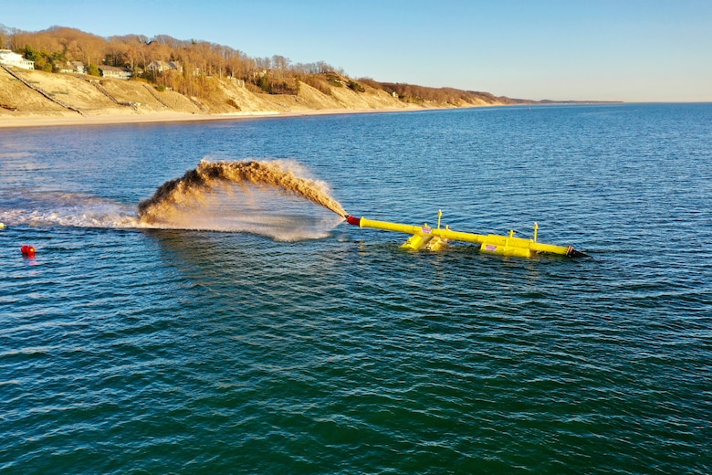 Annual U.S. Army Corps of Engineers, Detroit District maintenance dredging operations are scheduled to begin Friday, June 13, in the federal channel at outer Grand Haven Harbor, Michigan. The maintenance dredging will use a hydraulic dredging to place sediment in the nearshore area almost a mile south of the Grand Haven south pier to renourish eroded areas. (U.S. Army Corps of Engineers file photo.)