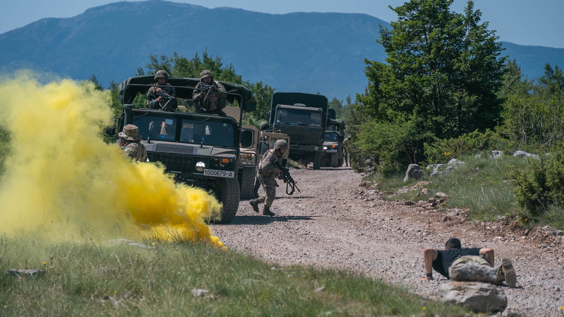 Maryland Army National Guard Soldiers of the 200th Military Police Company, 115th Military Police Battalion, and members of the Armed Forces of Bosnia and Herzegovina Light Infantry Battlegroup apprehend a suspect while conducting reconnaissance and convoy situational training with oppositional forces during Immediate Response–DEFENDER 25, near the Red Land Training Area, Knin, Croatia, June 1, 2025.