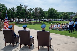 U.S. Airmen and family members gather for the 794th Communications Squadron change of command ceremony at Joint Base Anacostia-Bolling, Washington, D.C., June 10, 2025. The 794th CS led the way for multiple upgrades and renovations to JBAB’s communications infrastructure to ensure the continuation and modernization of critical IT support. (U.S. Air Force photo by Hayden Hallman)
