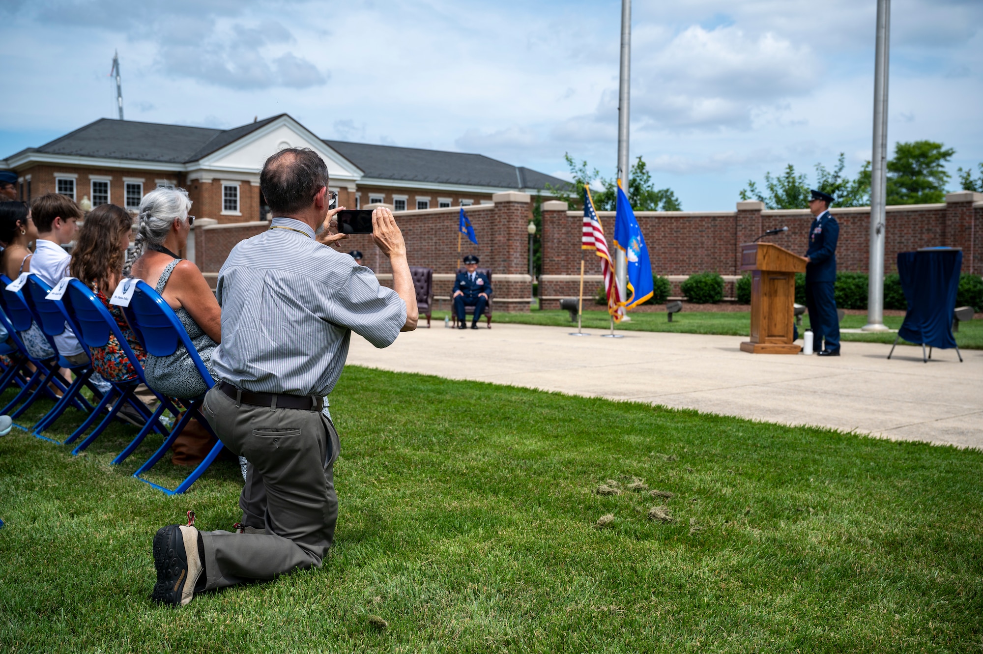 Retired U.S. Air Force Lt. Col. David P. Boyarski records his son Lt. Col. Daniel P. Boyarski, 794th Communications Squadron outgoing commander, during the 794th CS change of command ceremony at Joint Base Anacostia-Bolling, Washington, D.C., June 10, 2025. During Boyarski’s command, the 794th CS provided individual and unit customer support, information technology service management functions and improvements to joint basing information enterprise service functions. (U.S. Air Force photo by Hayden Hallman)