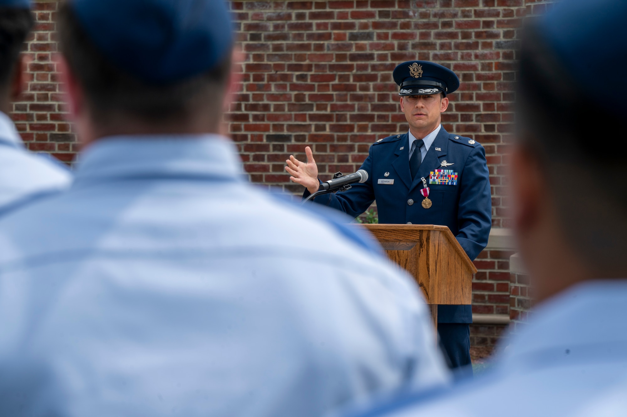 U.S. Air Force Lt. Col. Daniel P. Boyarski, 794th Communications Squadron outgoing commander, speaks to an audience of Airmen and family members during the 794th CS change of command ceremony at Joint Base Anacostia-Bolling, Washington, D.C., June 10, 2025. During Boyarski’s command, the 794th CS maintained vital communications infrastructure that approximately 70 agencies use on JBAB. (U.S. Air Force photo by Hayden Hallman)