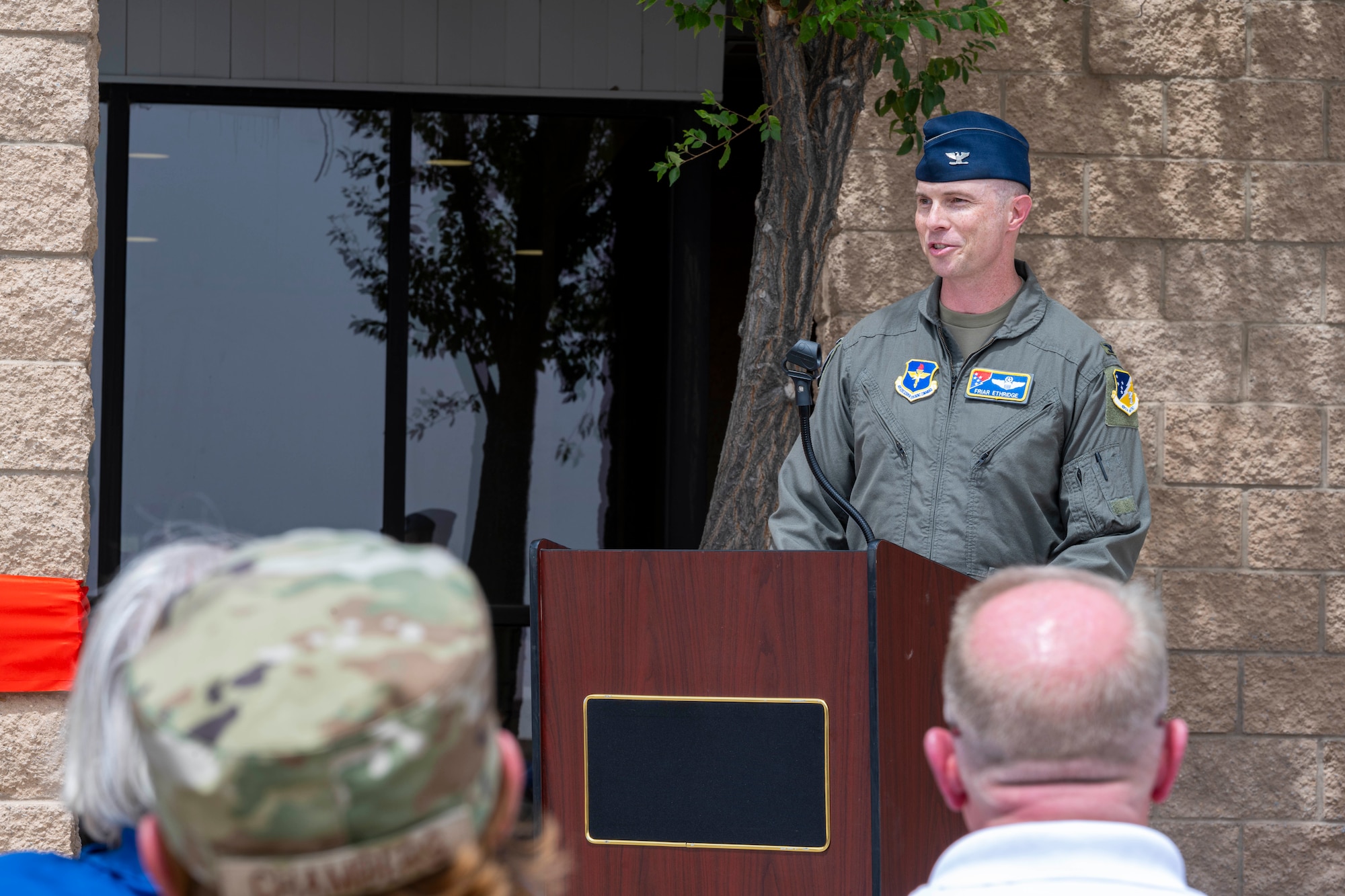 U.S. Air Force Col. John Ethridge, 49th Wing commander, gives opening remarks during a ribbon-cutting ceremony for the 49th Operation Group’s new facility at Holloman Air Force Base, New Mexico, May 30, 2025.