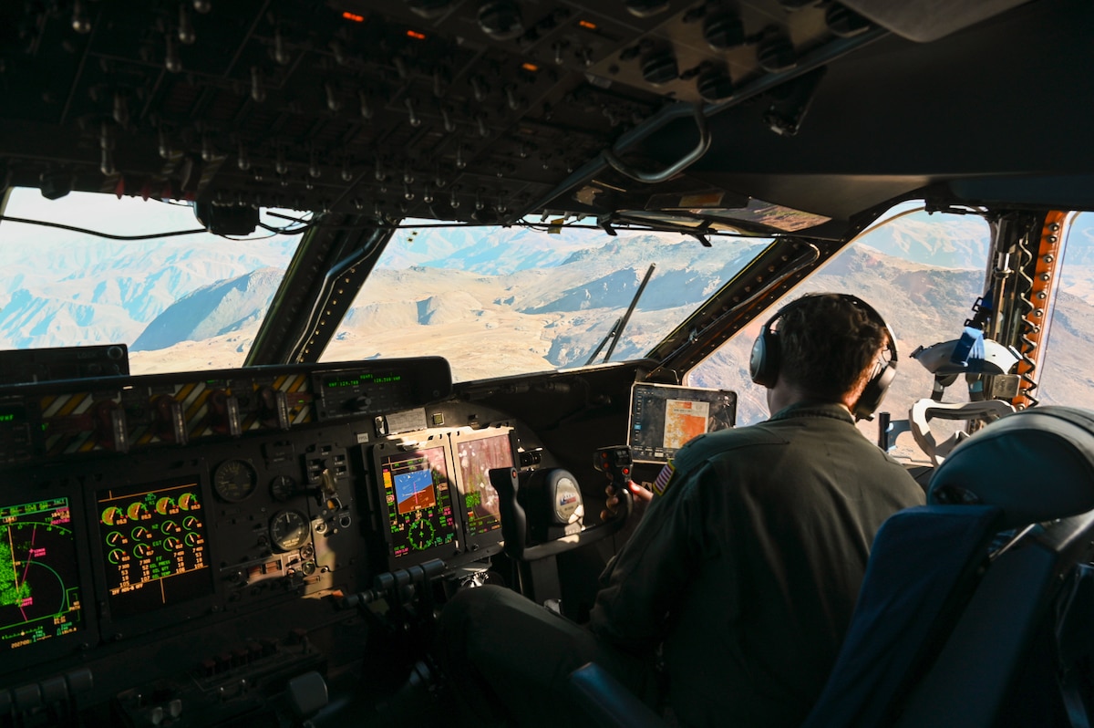 U.S. Air Force Maj. Pete Andersen, a 68th Airlift Squadron C-5M pilot, scans the terrain during a sortie as part of Exercise Southern Star ‘25 near Antofagasta, Chile, June 4, 2025.