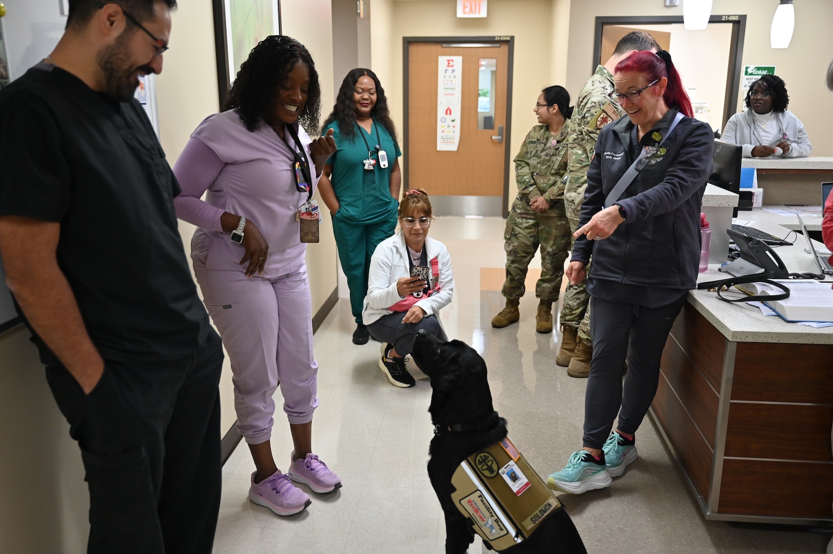 Photo of CRDAMC's Facility Dog Solomon interacting with FMRC