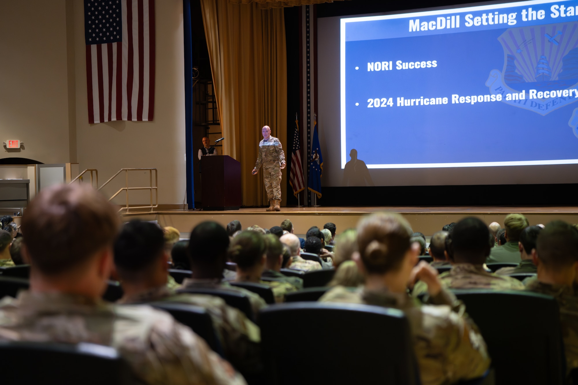 Air Force Chief of Staff Gen. David Allvin delivers remarks during an all-call at MacDill Air Force Base, Florida, June 12, 2025. During their remarks, Gen. Allvin and Chief Master Sergeant of the Air Force David Flosi addressed changes to Air Force standards, laid out plans for future deployment models and addressed the Air Force’s role in deterring near-peer adversaries. (U.S. Air Force photo by Airman 1st Class Helen Ly)