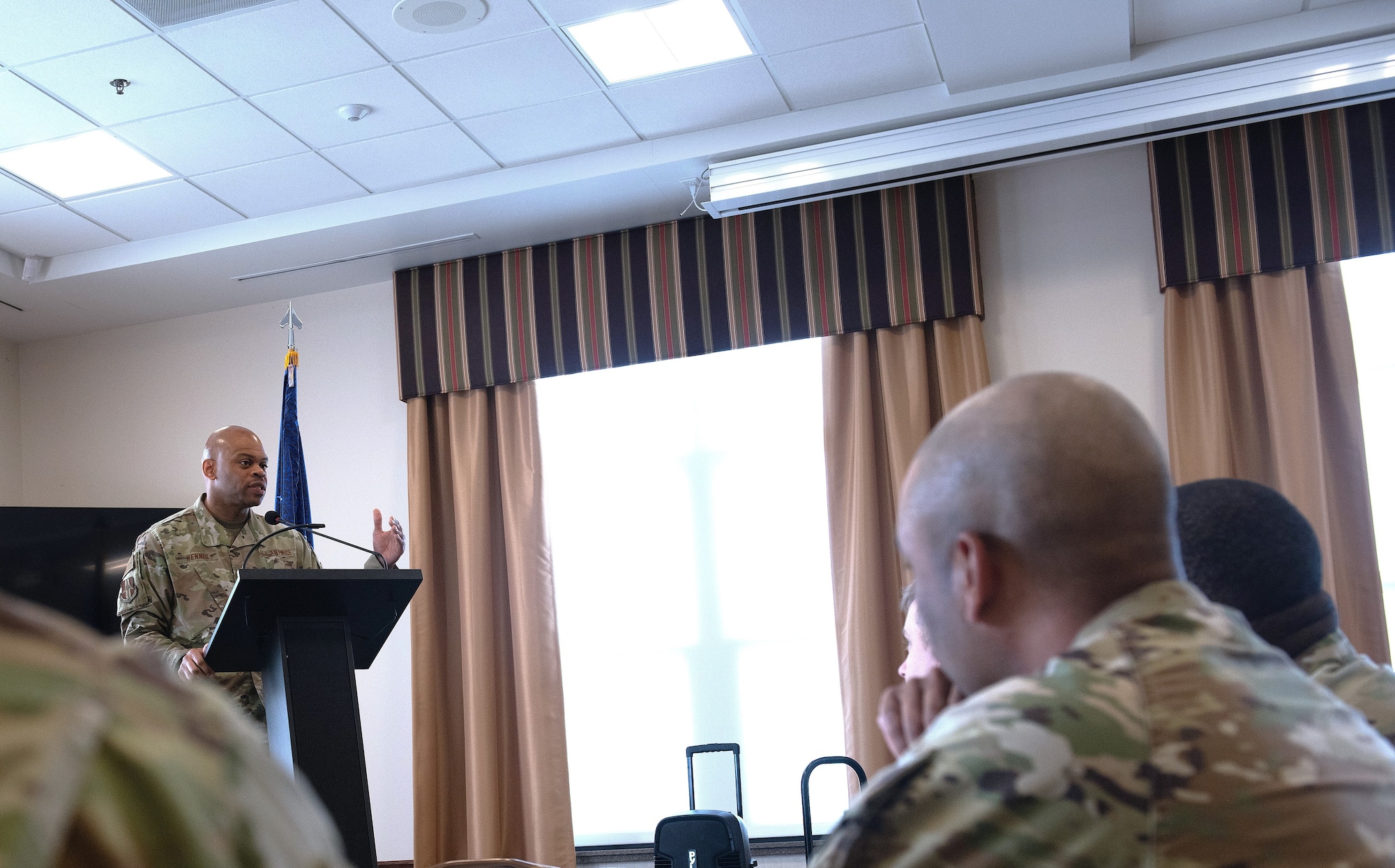 Command Chief Master Sgt. Travon Dennis, Fourth Air Force Command Chief, addresses First Sergeants from various Reserve Command units during a week-long symposium at Niagara Falls Air Reserve Station, New York, June 9, 2025.