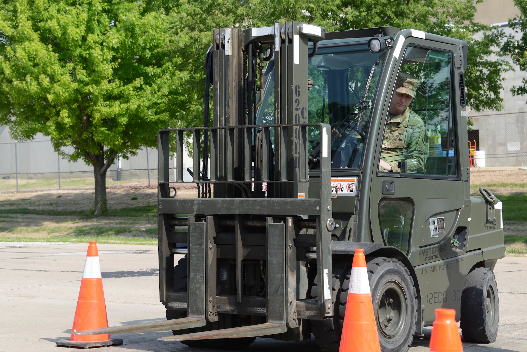 Senior Master Sgt. Cody Sorensen, 185th Air Refueling Wing Services Superintendent, drives a forklift in a cone obstacle course