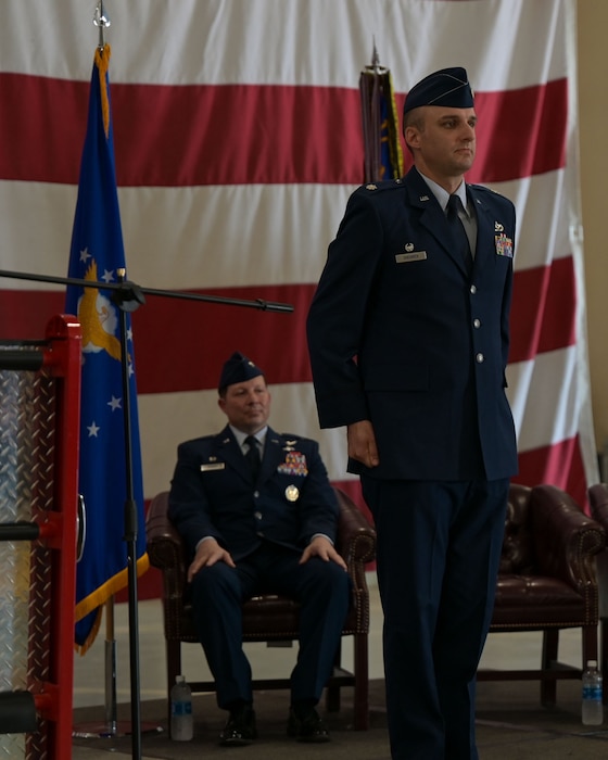 U.S. Air Force Lt. Col. Benjamin Shearer, 312th Training Squadron new commander, stands at attention during the change of command ceremony at the Louis F. Garland Department of Defense Fire Academy, Goodfellow Air Force Base, Texas, June 12, 2025. Before joining the 312th TRS, Shearer was the 509th Civil Engineering Squadron operations flight commander. (U.S. Air Force photo by Senior Airman Evelyn J. D’Errico)