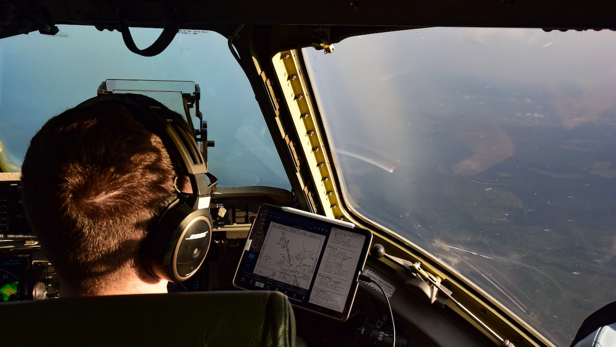 A U.S Air Force pilot looks at airport material