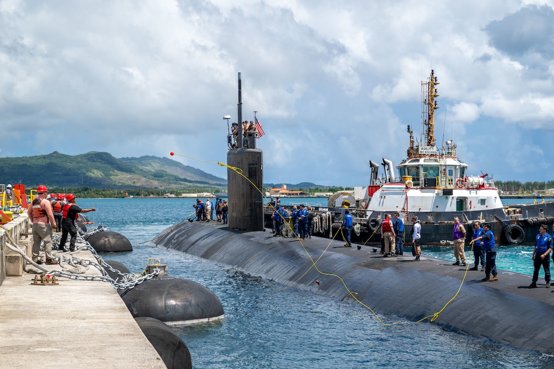 Sailors assigned to the Los Angeles-class fast-attack submarine USS Annapolis (SSN 760) conduct mooring operations at Polaris Point, Naval Base Guam, June 11, 2025.