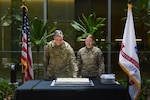 Lt. Col Sean Ontiveros, (left) director of expeditionary support and Sgt. Annabelle Hall, mortuary affairs specialist assigned to the Defense POW/MIA Accounting Agency, cut the cake during the 250th Army Birthday cake cutting ceremony held on Joint Base Pearl Harbor-Hickam, Hawaii, June 13, 2025. The ceremony was held to commemorate the Army's birthday honoring 250 years of rich history and defense of the nation. (U.S. Army Photo by Sgt. Anthony Todd)