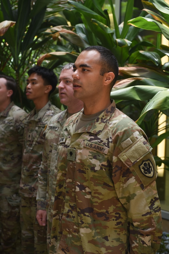 Spc. Jonathan Maisonet, a communications specialist assigned to the Defense POW/MIA Accounting Agency, sings the Army song during the 250th Army Birthday cake cutting ceremony held on Joint Base Pearl Harbor-Hickam, Hawaii, June 13, 2025. The ceremony was held to commemorate the Army's birthday honoring 250 years of rich history and defense of the nation.