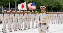 Japanese troops perform honor duties to welcome Air Force Gen. Randall Reed, commander of U.S. Transportation Command, to Japan’s Ministry of Defense in Tokyo, Japan, June 6, 2025.