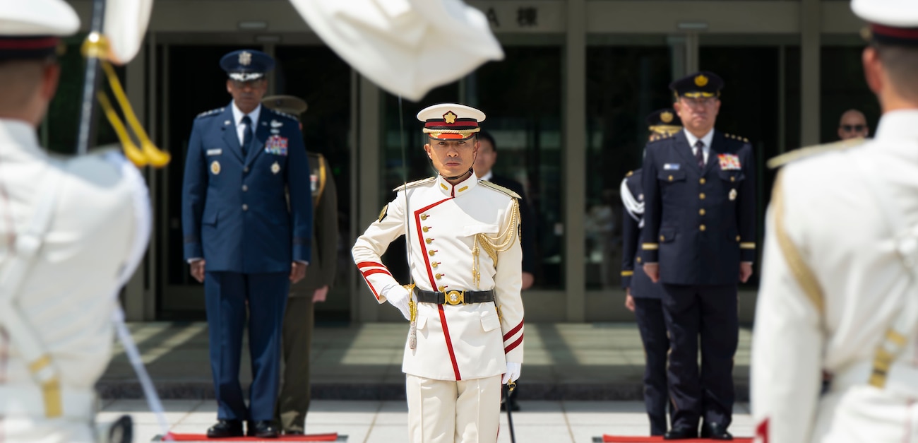 Japanese troops perform honor duties to welcome Air Force Gen. Randall Reed, commander of U.S. Transportation Command, to Japan’s Ministry of Defense in Tokyo, Japan, June 6, 2025.