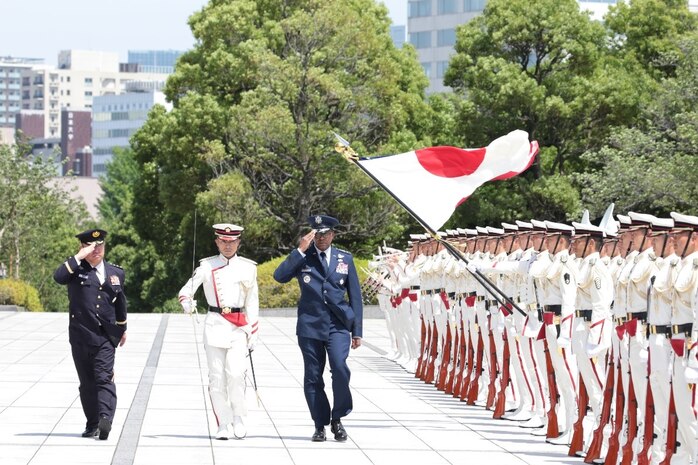 Japanese troops perform honor duties to welcome Air Force Gen. Randall Reed, commander of U.S. Transportation Command, to Japan’s Ministry of Defense in Tokyo, Japan, June 6, 2025.