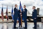 U.S. Air Force commander passes the guidon signifying the end of his time as commander.