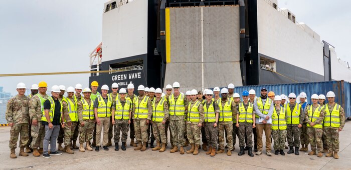 U.S. and Republic of Korea members take a group photo with Air Force Gen. Randall Reed, commander of U.S. Transportation Command, during his tour at Pyeongtaek Port, South Korea, June 10, 2025.