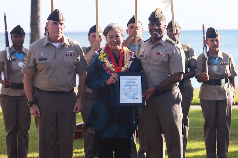 From left to right, Command Sgt. Maj. Jason Schmidt, U.S. Army Pacific senior enlisted advisor, Maj. Gen. (Ret) Suzanne Puanani Vares-Lum, Gen. Ronald P. Clark, U.S. Army Pacific commanding general pose for a photo Jun. 12, 2025, during the Mana O Ke Koa award ceremony held at Historic Palm Circle, Ft. Shafter, Hawaii.