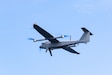 A Jump 20 group 3 Unmanned Aerial System conducts a flight to provide surveillance for maritime interception operations during Amphibious Ready Group Marine Expeditionary Unit exercise (ARGMEUEX), while underway in the Atlantic Ocean, May 15, 2025. During ARGMEUEX, the 22nd MEU, aboard Iwo Jima Amphibious Ready Group (IWOARG) shipping, conducts training in support of various mission essential tasks that enhance operational readiness and lethality as a unified IWOARG/22 MEU team. (U.S. Marine Corps photo by Sgt. Nathan Mitchell)