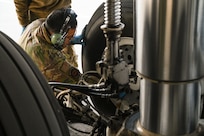 U.S. Air Force Staff Sgt. Sergio Rosas, a 433rd Aircraft Maintenance Squadron aerospace propulsion specialist, conducts pre-flight servicing on the landing gear of a C-5M Super Galaxy ahead of a sortie as part of Exercise Southern Star ‘25 at Arturo Merino Benitez International Airport in Santiago, Chile, June 4, 2025.