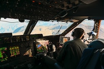 U.S. Air Force Maj. Pete Andersen, a 68th Airlift Squadron C-5M pilot, scans the terrain during a sortie as part of Exercise Southern Star ‘25 near Antofagasta, Chile, June 4, 2025.