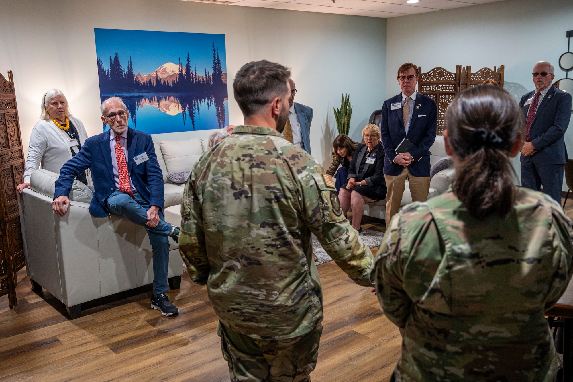 Team McChord Airmen brief Members of the Defense Orientation Conference Association about the Summit Room at Joint Base Lewis-McChord, Washington, June 11, 2025.