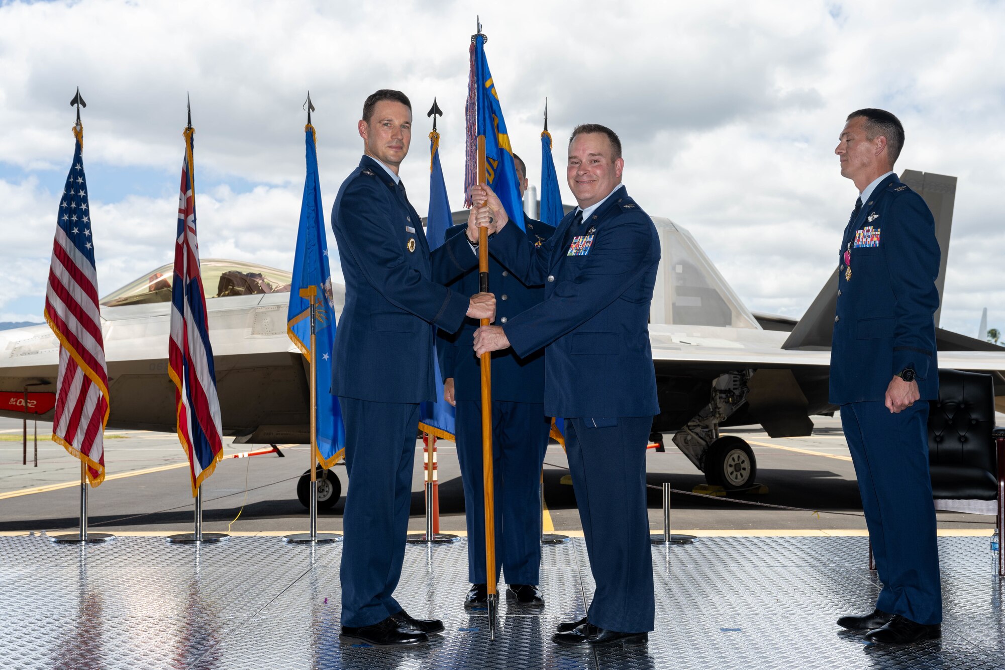 A U.S. Air Force commander receives the guidon signifying the beginning of his time as commander.
