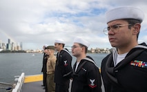 250614-N-PV363-1071 SYDNEY, Australia (June 14, 2025) Sailors assigned to the forward-deployed amphibious assault ship USS America (LHA 6) and Marines assigned to the 31st Marine Expeditionary Unit (MEU) man the rails onboard America, while in Sydney, June 14. America, lead ship of the America Amphibious Ready Group, is operating in the U.S. 7th Fleet area of operations. U.S. 7th Fleet is the U.S. Navy’s largest forward-deployed numbered fleet, and routinely interacts and operates with allies and partners in preserving a free and open Indo-Pacific region. (U.S. Navy photo by Mass Communication Specialist 3rd Class Darian Lord)